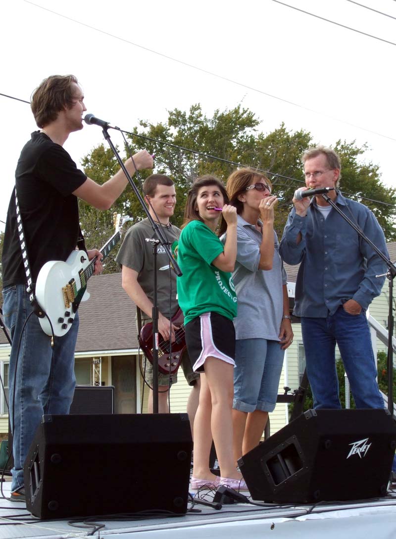photo of people singing